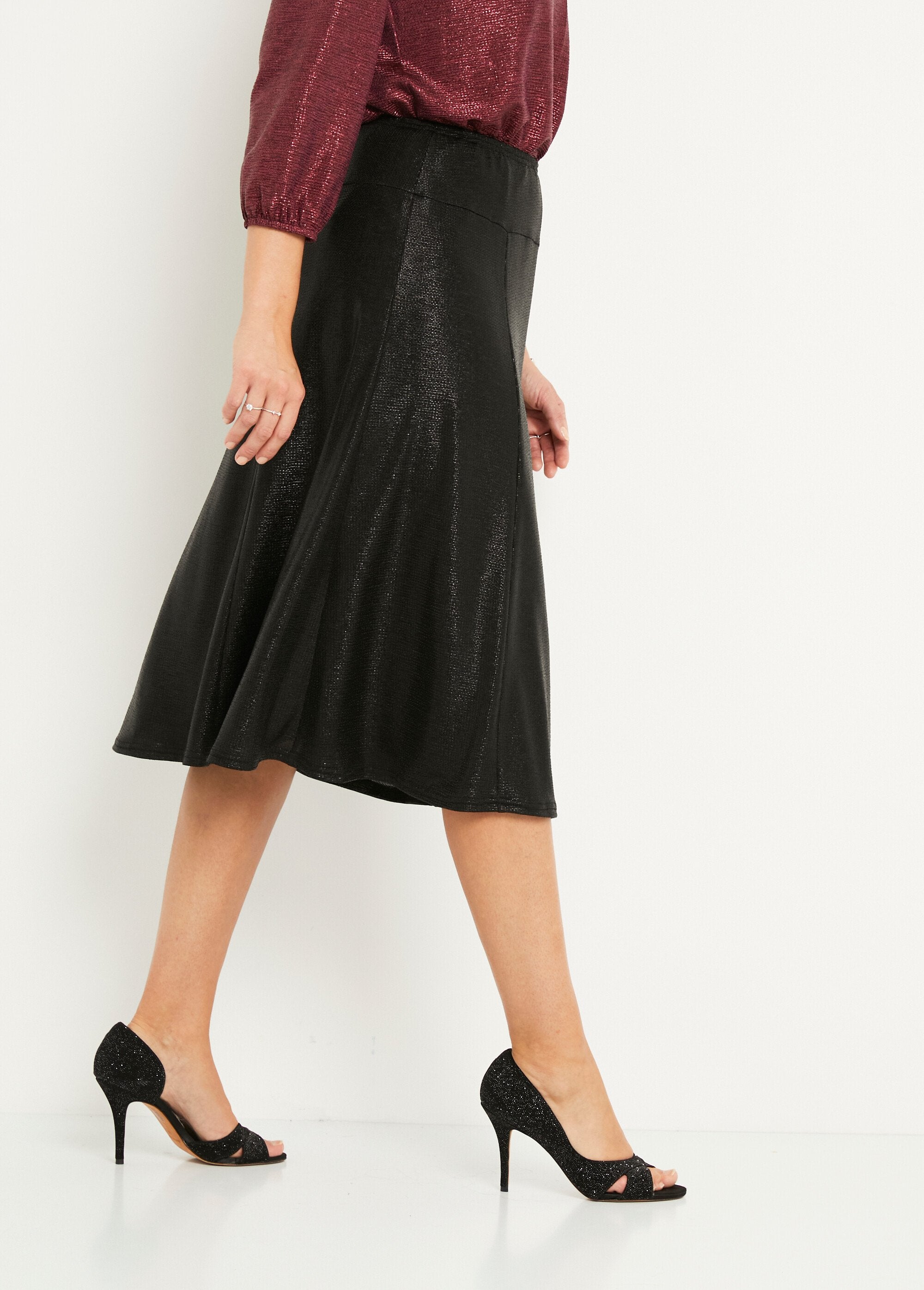 Mid-length_flared_skirt_in_shiny_knit_Black_DR1_slim